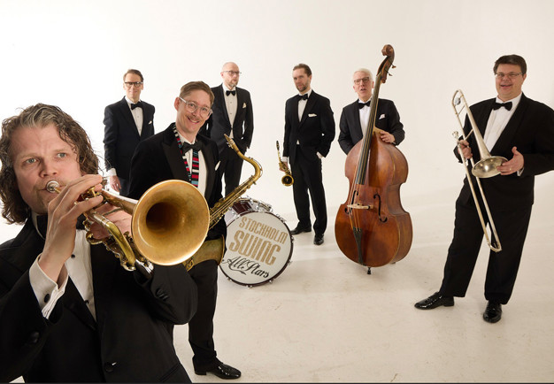 Musiker som spelar. Fotografi.