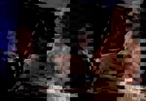 Kvinna som sjunger. Fotografi.