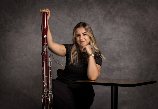 Porträttbild på en leende kvinna. Fotografi..